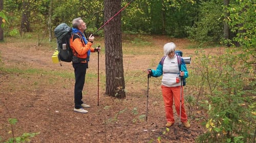 Hiking Tourism Adventure Senior Couple Man Woman Enjoying Outdoor Recreation Hiking in Forest Happy