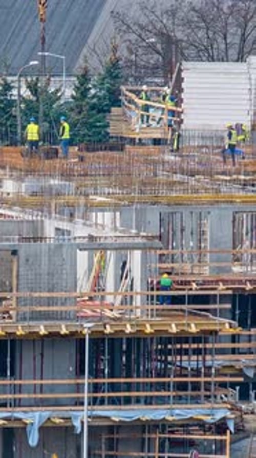 Timelapse of Teamwork at Construction Site of Modern Condo Residential Building