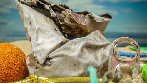 A Beach Filling Up with Trash
