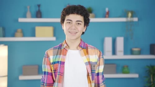 Teen Speaking and Gesturing in Front of Shelves