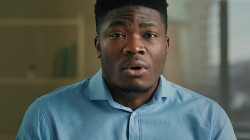 Man Reacts to Something With Concern, Close Up