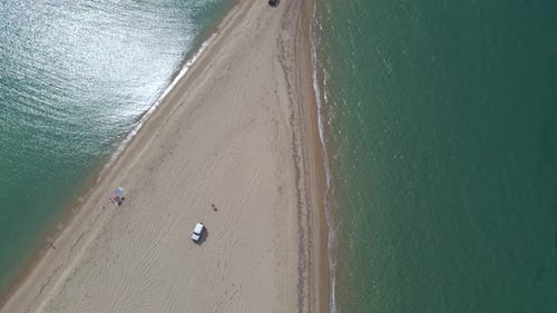 4k tilt up clip over a peninsula on the tropical beach of Epanomi, Halkidiki, Greece