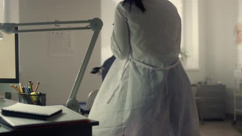 Doctor Woman Taking Tonometer Stethoscope To Measure Pressure Elderly Patient Sitting Hospital. Y...