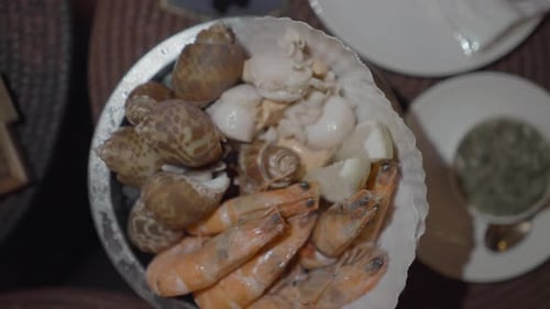 Top View of Delicious Shrimp and Snail Thai Food Restaurant in Mall Asiatique in Bangkok