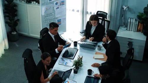 Overhead Shot of Business Team Meeting in Office