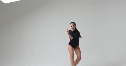 Female Dancer Performing Contemporary Dance in Studio