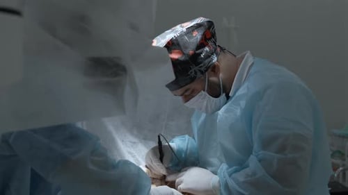 Surgeon Performing Operation in a Hospital Setting