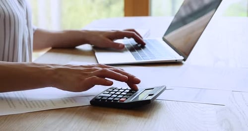 Financial Planning at Home Calculating Taxes Budgeting and Doing Bookkeeping