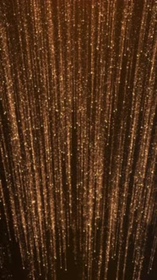 Golden Falling Particles Abstract Luxury Background Shimmering Gold Light Streaks Glitter Rain