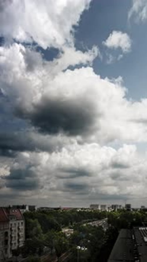 cityscape stormy clouds fast move timelapse weather city traffic fast road