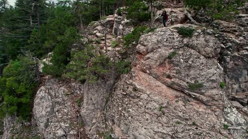 Hiker on Rocky Mountain Top