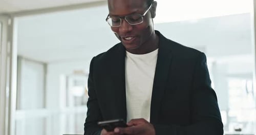 Happy business man, cellphone and typing in office for social network, funny mobile chat