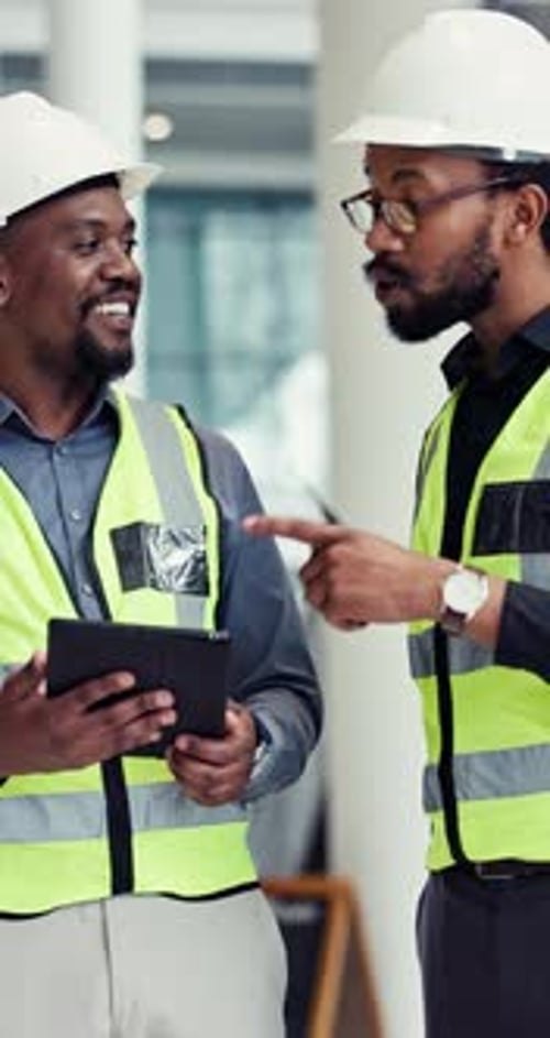 Men, engineer and tablet with talking in office for construction, advice and consulting for project