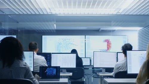 Team of Computer Engineers Work on Machine Learning Neural Network Technology Development.