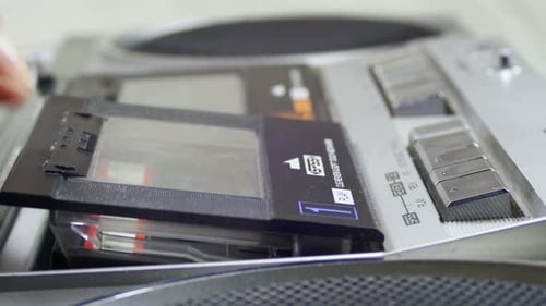 Opening the Cassette Deck Inserting a Cassette and Playing a Tape Recorder