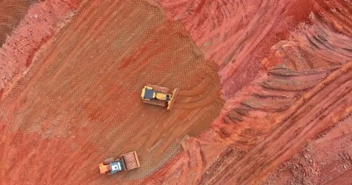 A Construction Industrial Grader is Used in the Process of Leveling the Land to Prepare It to Be