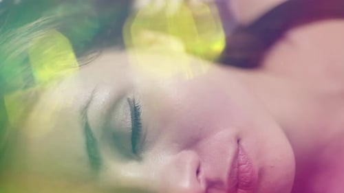 Woman Lying Down with Light Flares