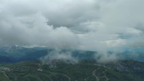 Clouds Over Summer Green Mountains