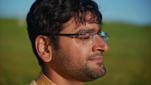 Close Up of Man Wearing Glasses Outdoors