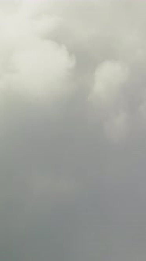 Aerial view of industrial plant belching plumes of smoke