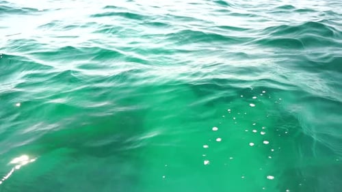 Sea Water Surface Camera Flies Over the Calm Azure Sea Nobody Holiday Recreation Concept Abstract