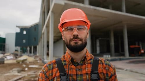 Construction Worker in Hard Hat Looking at Camera
