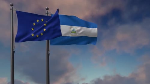 European Union and Nicaragua Flags Waving Under Blue Sky