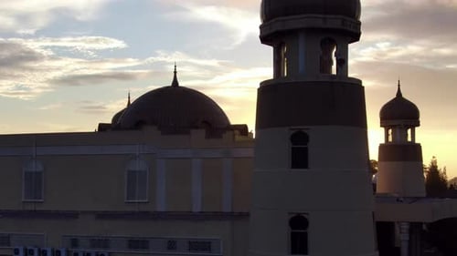 Drone Aerial Footage ascending/ descending during the sunset, showing beautiful sun rays