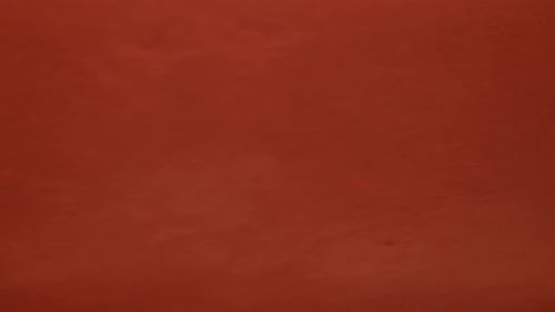 Abstract Orange Liquid Texture Flowing Across Warm Background