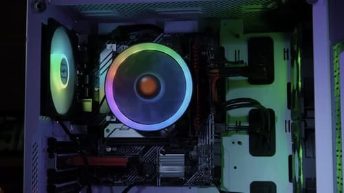 RGB Light on of Personal Computer Cooling Unit with the Fan of the Stylish Modern PC Close Up