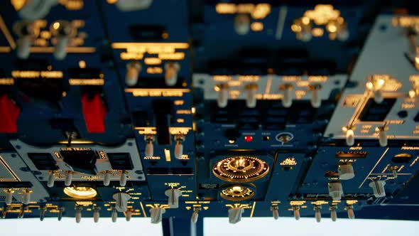 Close-up of the overhead panel of a modern airplane with buttons and ...