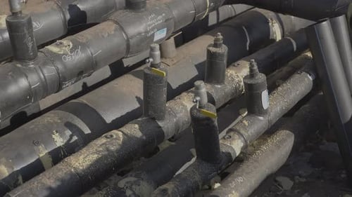 Interconnected Black Pipes in an Industrial Array