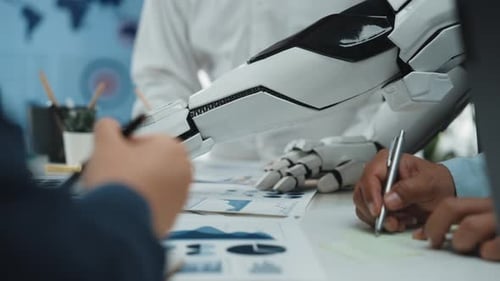 Business Meeting with Robot Arm Analyzing Data