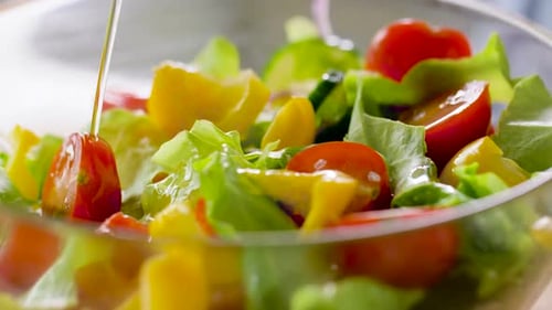 Olive Oil Drizzle Making a Fresh Vibrant and Healthy Garden Salad