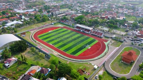 Drone view from top of soccer field. Football stadium. Outdoor sports