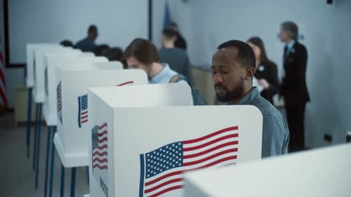 African American Citizen Comes to Vote in Polling Booth