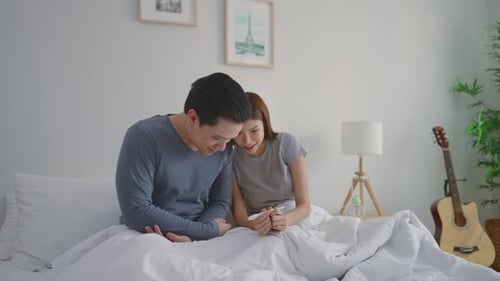 Joyful Couple Celebrate Positive Pregnancy Test Result