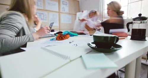 4k video footage of a group of businesspeople having a meeting in a modern office in time lapse