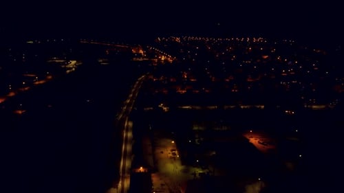 Fireworks in the city to welcome the New Year. Flying through the small town of Valmiera.