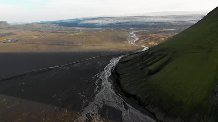 Aerial View Of Maelifell Volcano And Icelandic Landscape At Sunset aerial-view-of-maelifell-volcano-and-icelandic-landscape-at-sunset