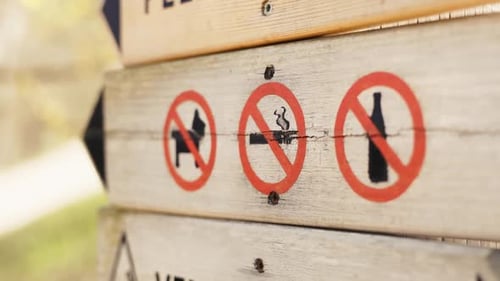 Wooden Sign Indicating Prohibited Items