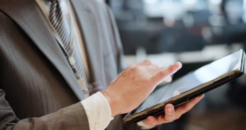 Hands, businessman and tablet for communication or networking in office for scroll, news and app