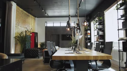 Discover Modern Office Interior Design with Sleek Furniture and Vibrant Greenery