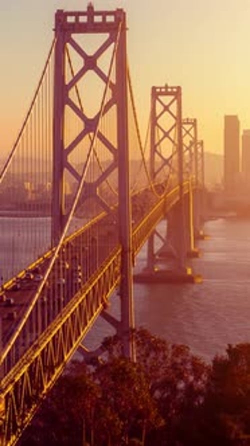 Traffic on San Francisco's Bay Bridge at Sunset. Vertical Video.