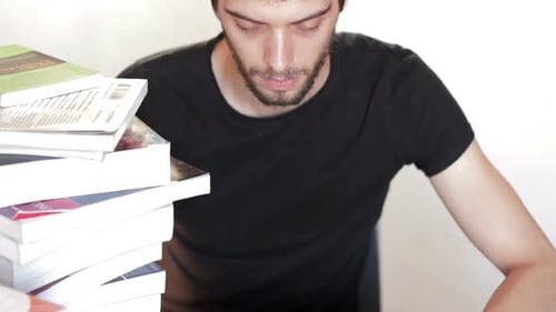 Male college student using tablet computer