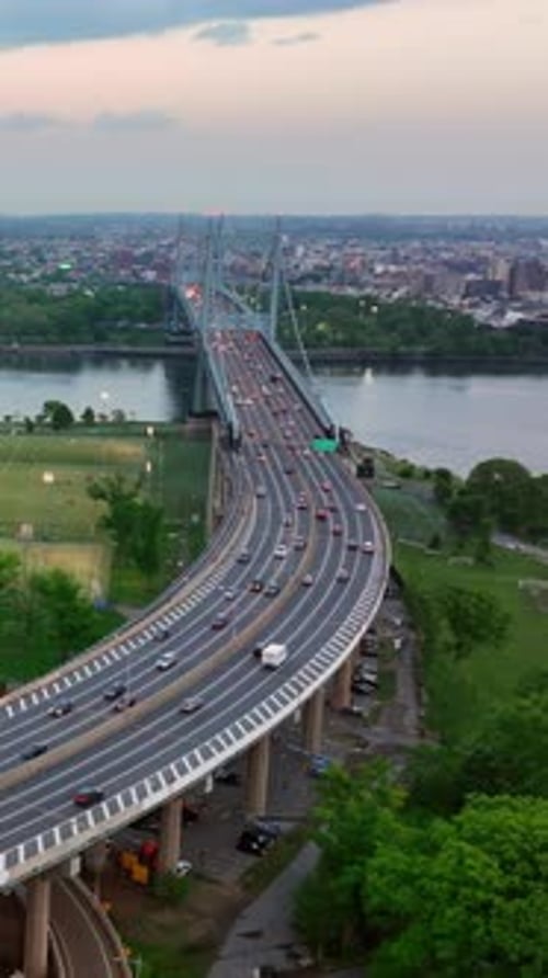 Flyover with numerous moving cars leading to the Triborough bridge in New York.
