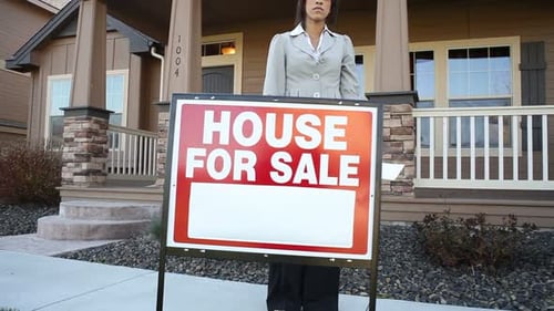 Realtor in Front of a House Broker