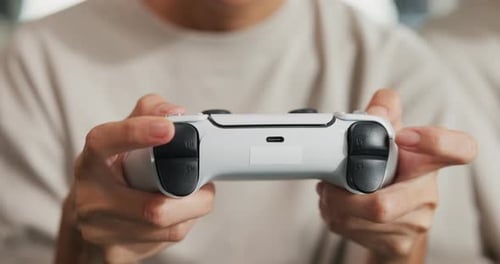 Woman Playing Video Games with Controller