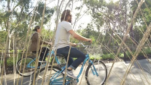 Gatlinburg, TN / USA - July 10, 2017: Couple on Bikes Tracking