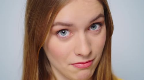 Woman's Face with Expressions of Disbelief and Suspicion